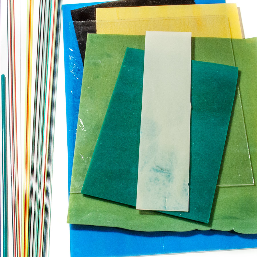 Lasilevyjä ja puikkoja